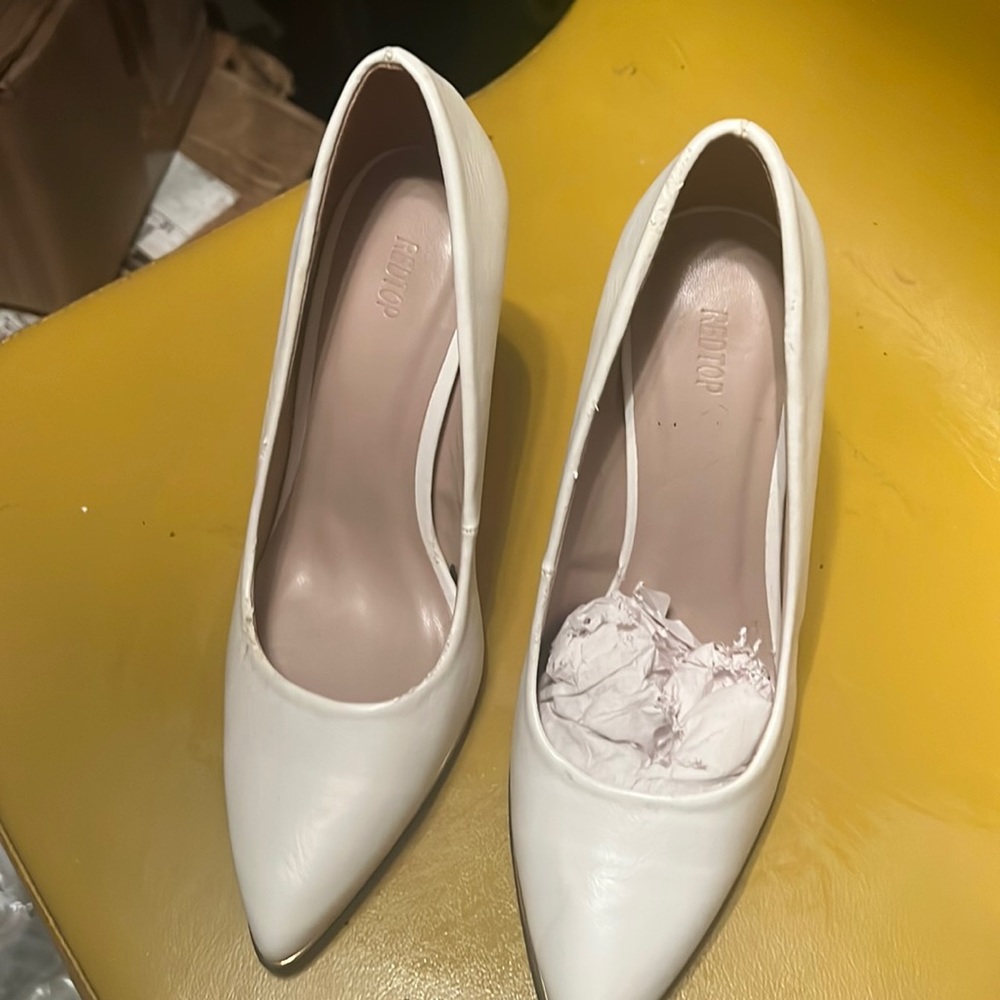 White heels with gold rim